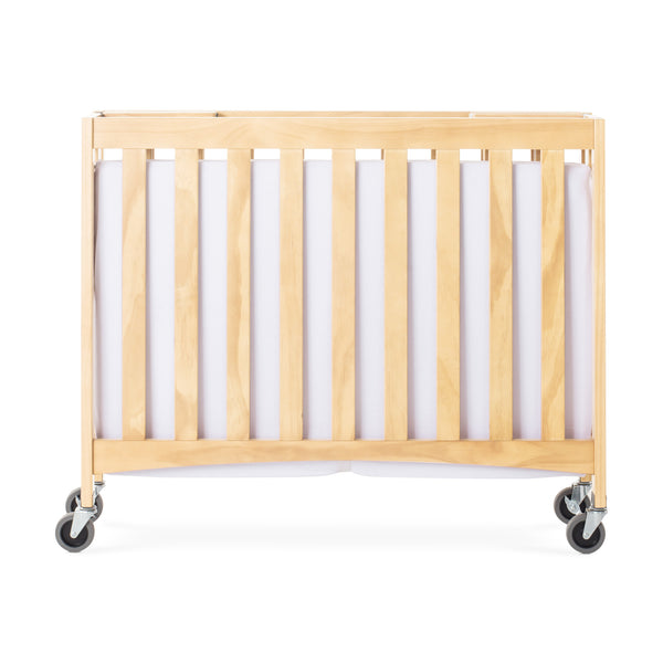 #48394 Compact Travel Sleeper™ Folding Crib, Slatted w/ Oversized Casters (Foam Mattress)